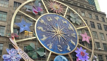 Christian Dior holiday window astrology